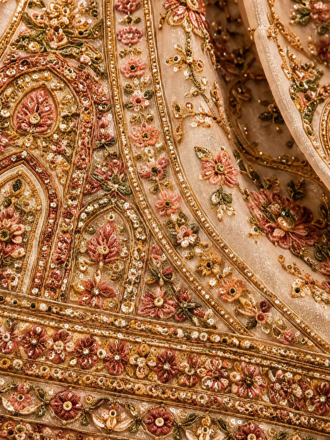 Cream Pink Panel Style Raw Silk Bridal Lehenga with Leaf Neck Blouse