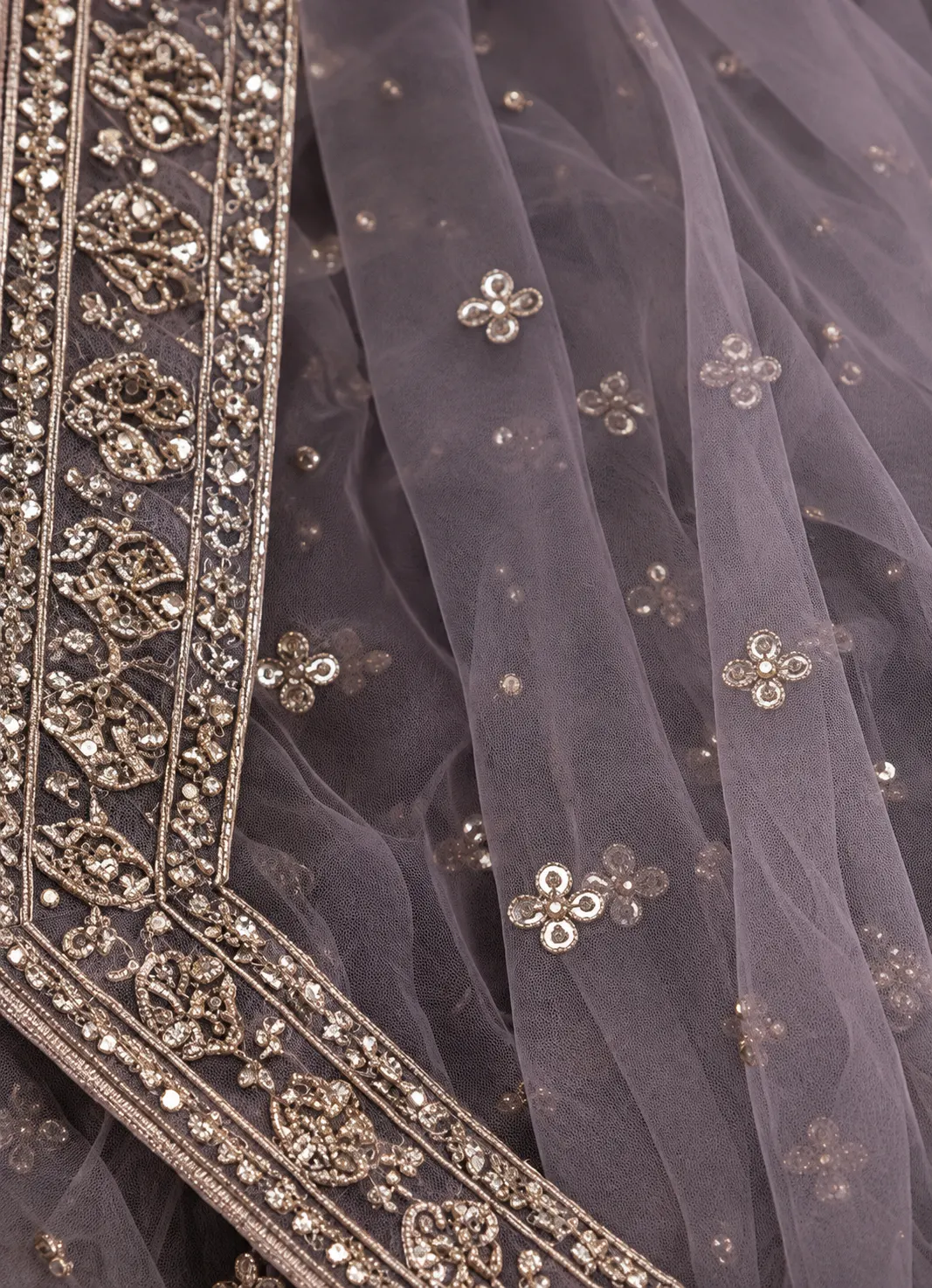 Grey Lavender Net Reception Lehenga with Embroidered Full Sleeve Blouse