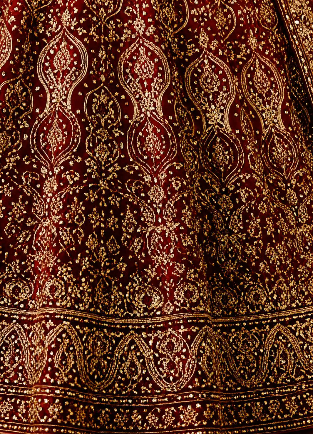 Dark Red Zari Embroidered Silk Bridal Lehenga with Leaf Neck Blouse-