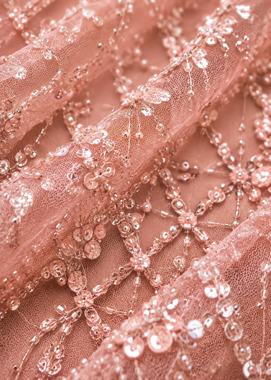 Pastel Pink Sequins Embroidered Net Fish Cut Lehenga with Sweet Heart Neck